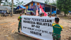 Satgas Pamtas Yonarmed 11 Kostrad Laksanakan Pemeliharaan Patok Batas Negara