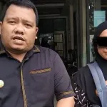 Michael Parluhutan Turnip, S.H., selaku kuasa hukum bersama istri AS