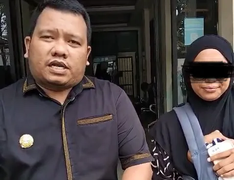 Michael Parluhutan Turnip, S.H., selaku kuasa hukum bersama istri AS